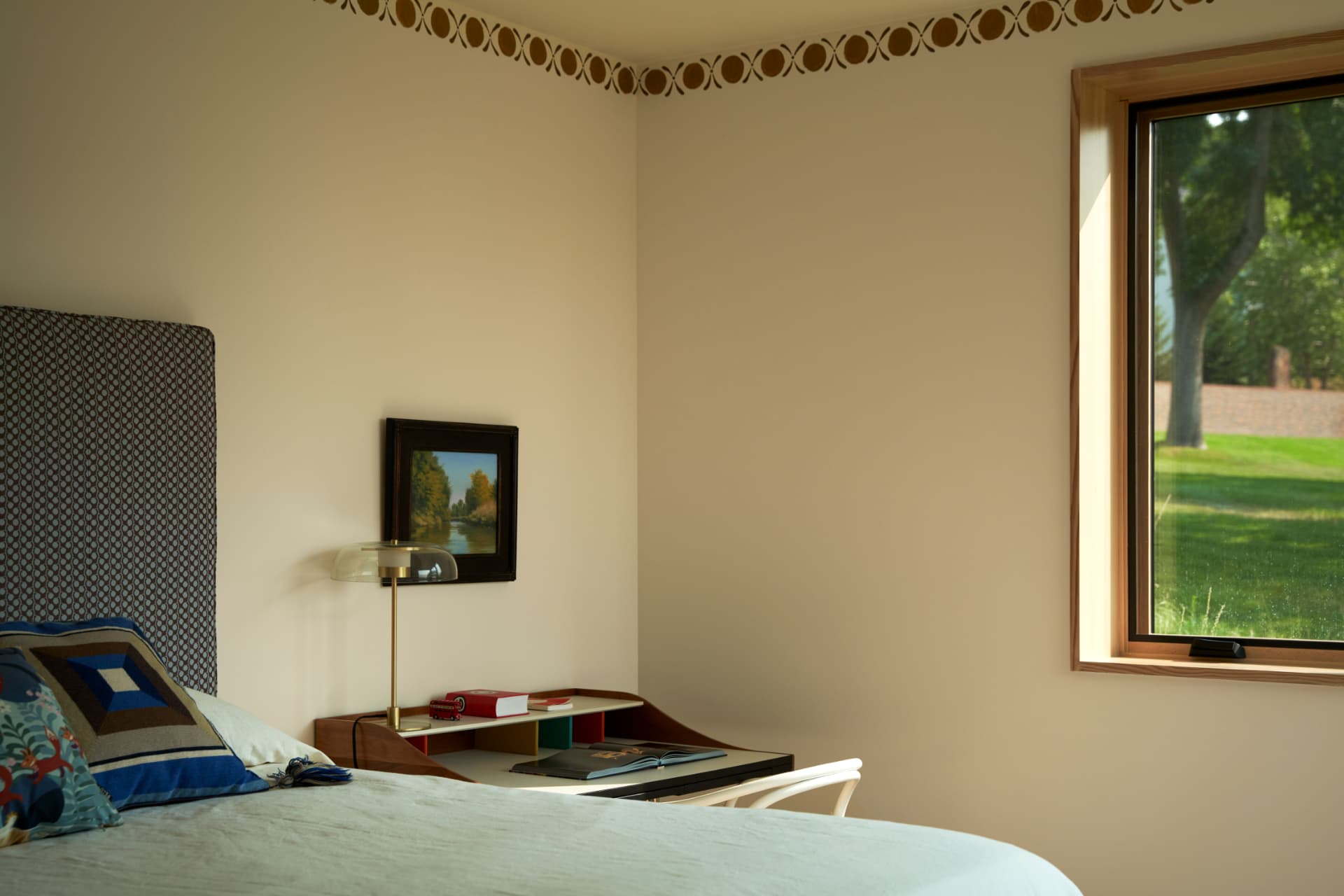 Hill House guest room desk beneath a sunlit window