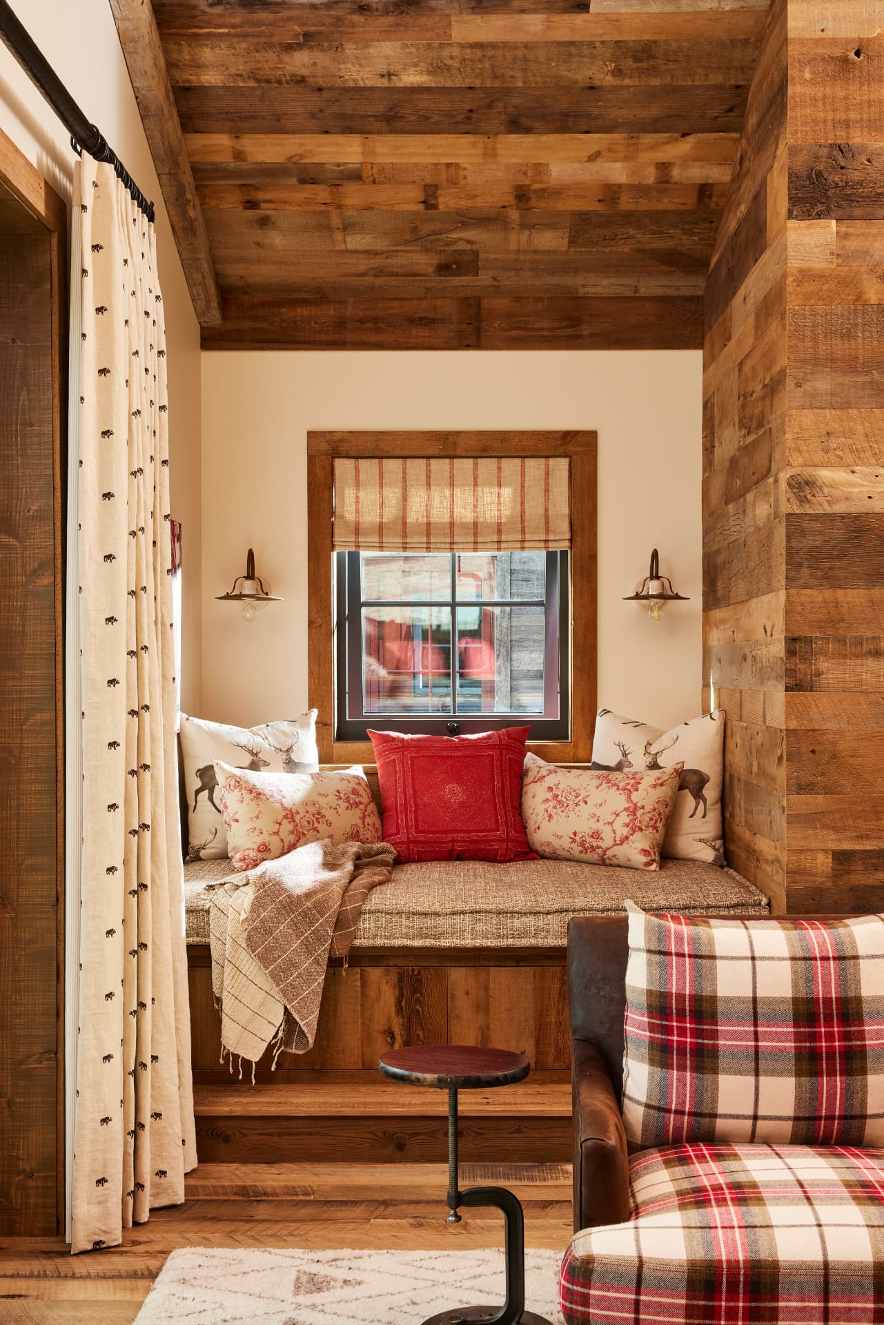Timber Retreat window seat with plaid pillows