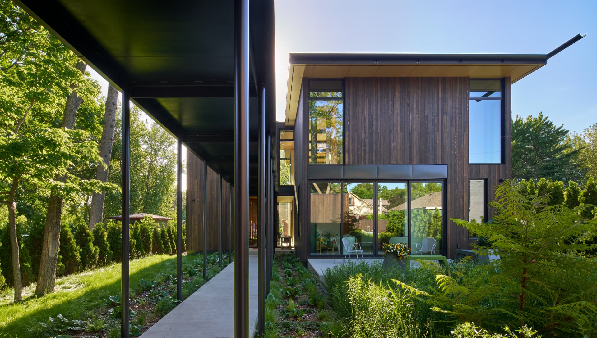 River’s Edge covered walkway and garden courtyard
