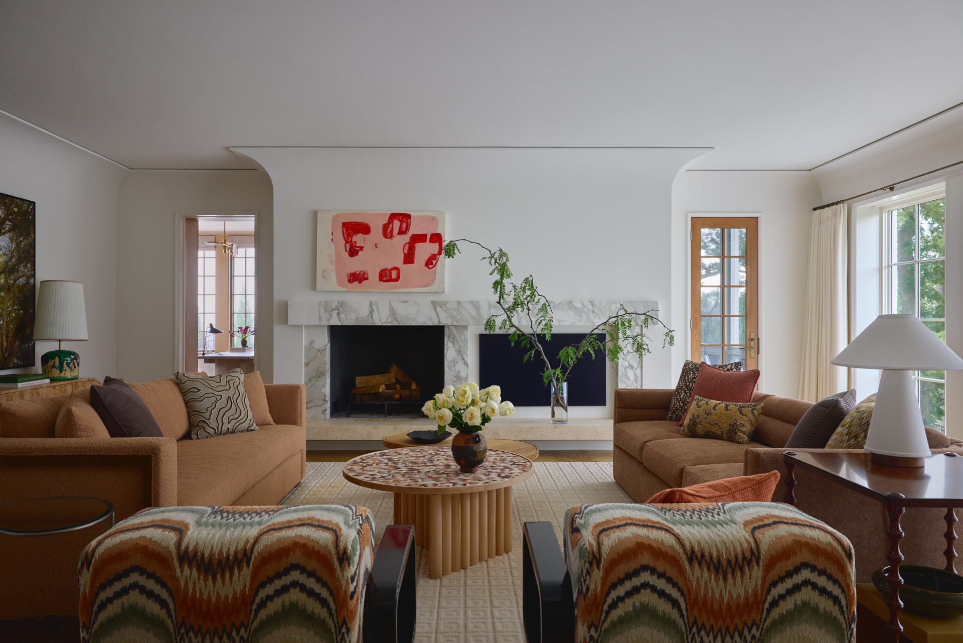 Waters Edge living room with marble fireplace