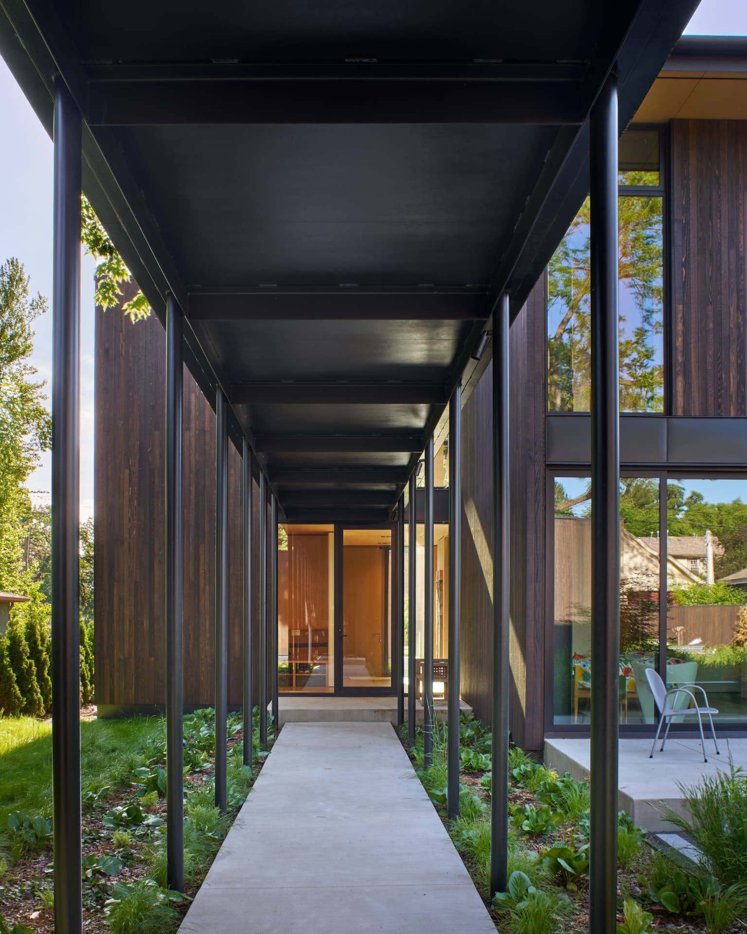 River’s Edge covered walkway leading to the entry