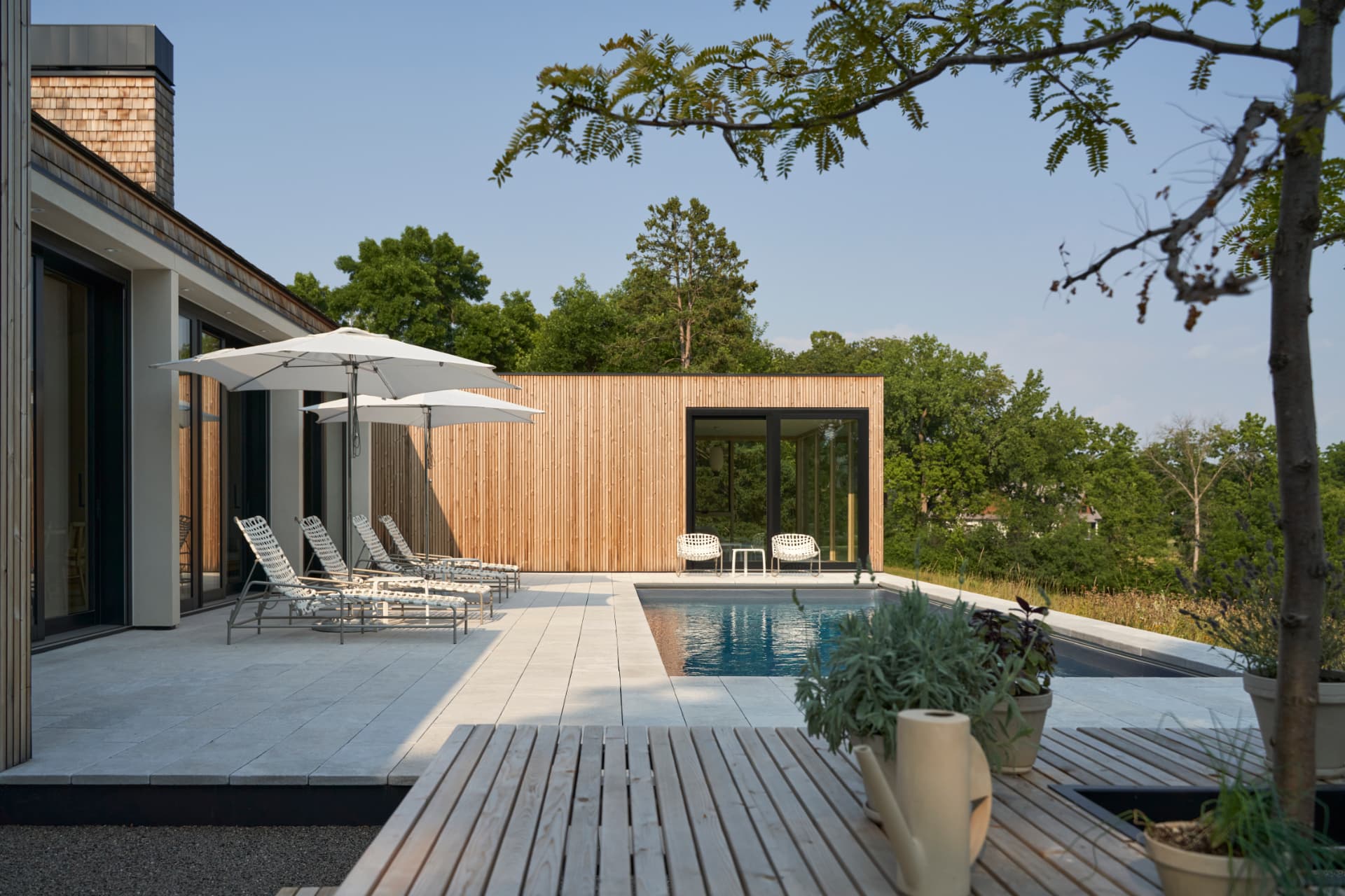 Hill House pool patio and cedar pavilion