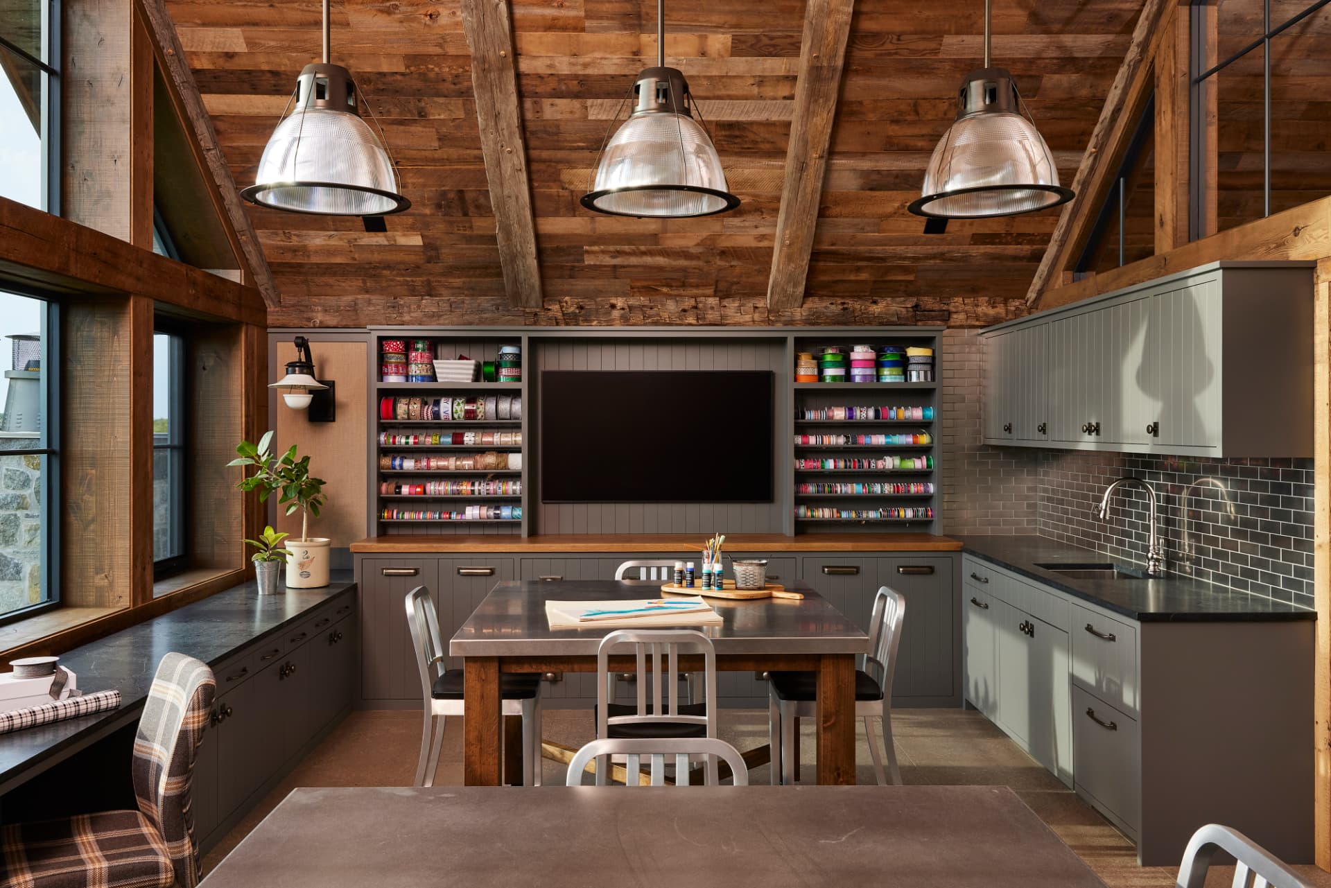 Timber Retreat craft room with timber ceiling and industrial lights