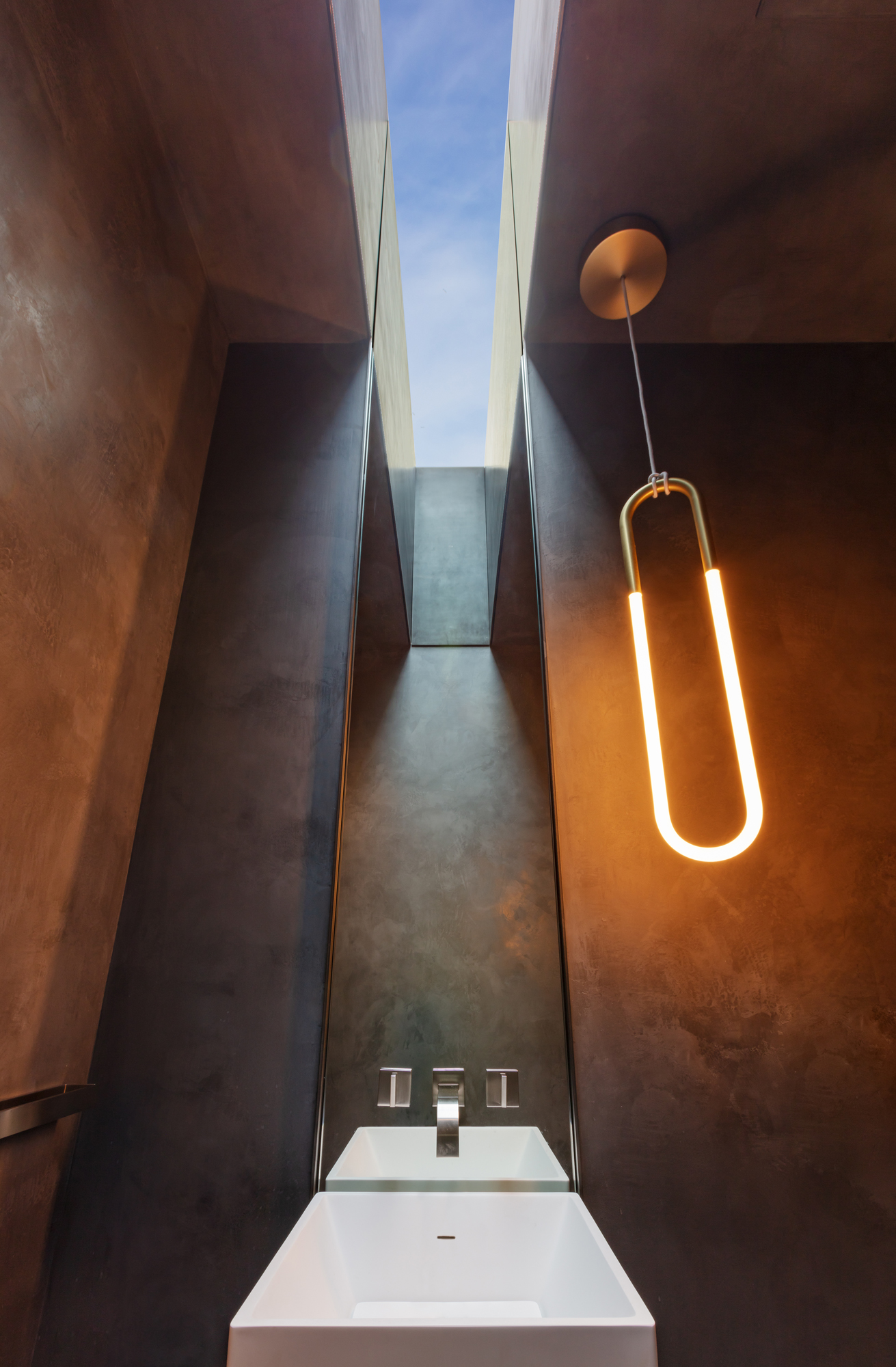 Bayside powder room skylight and pendant