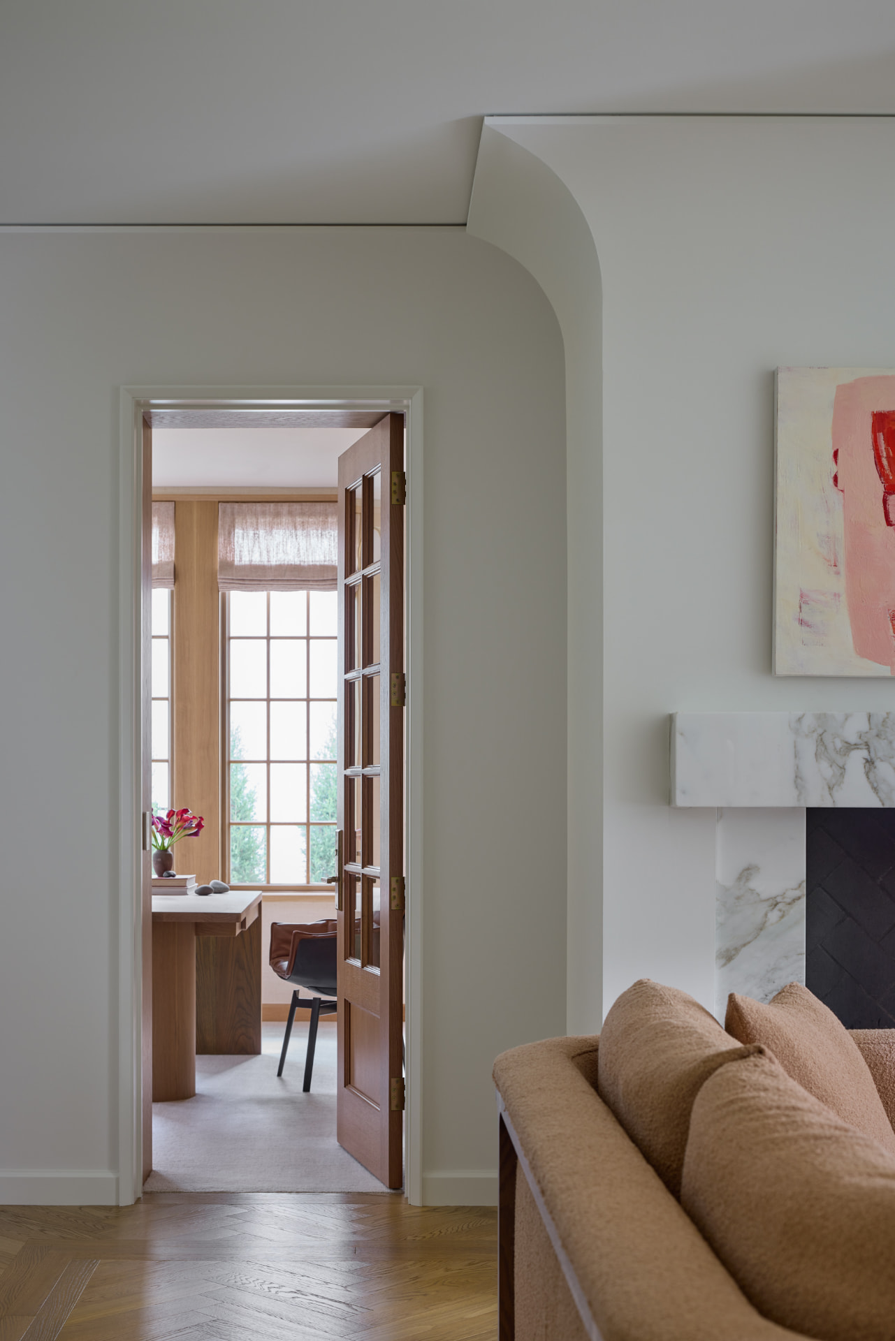 Waters Edge arched living room passage to the office