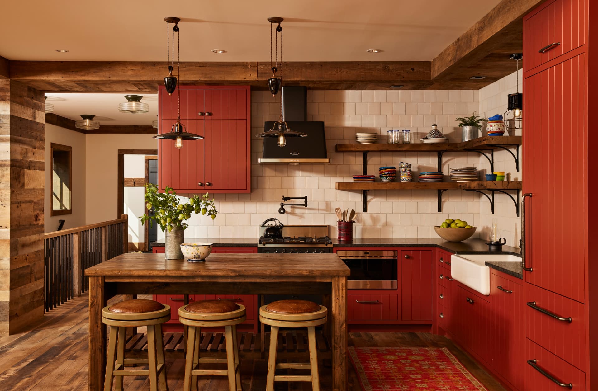 Timber Retreat kitchen with red cabinets and open shelving