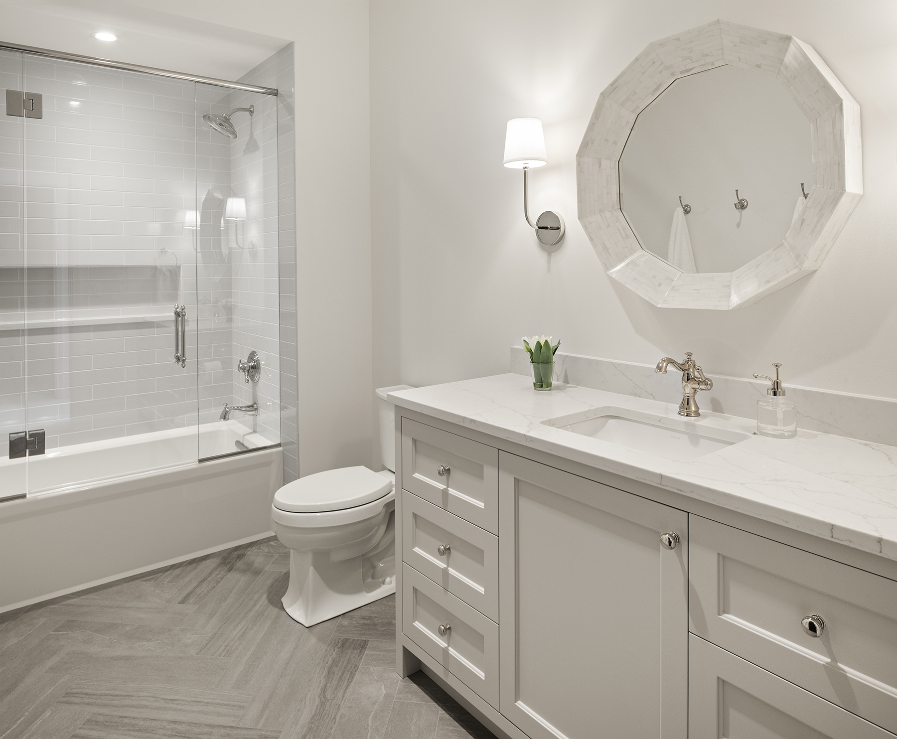 Highcroft bath with tub and shower, marble counters and octagonal mirror