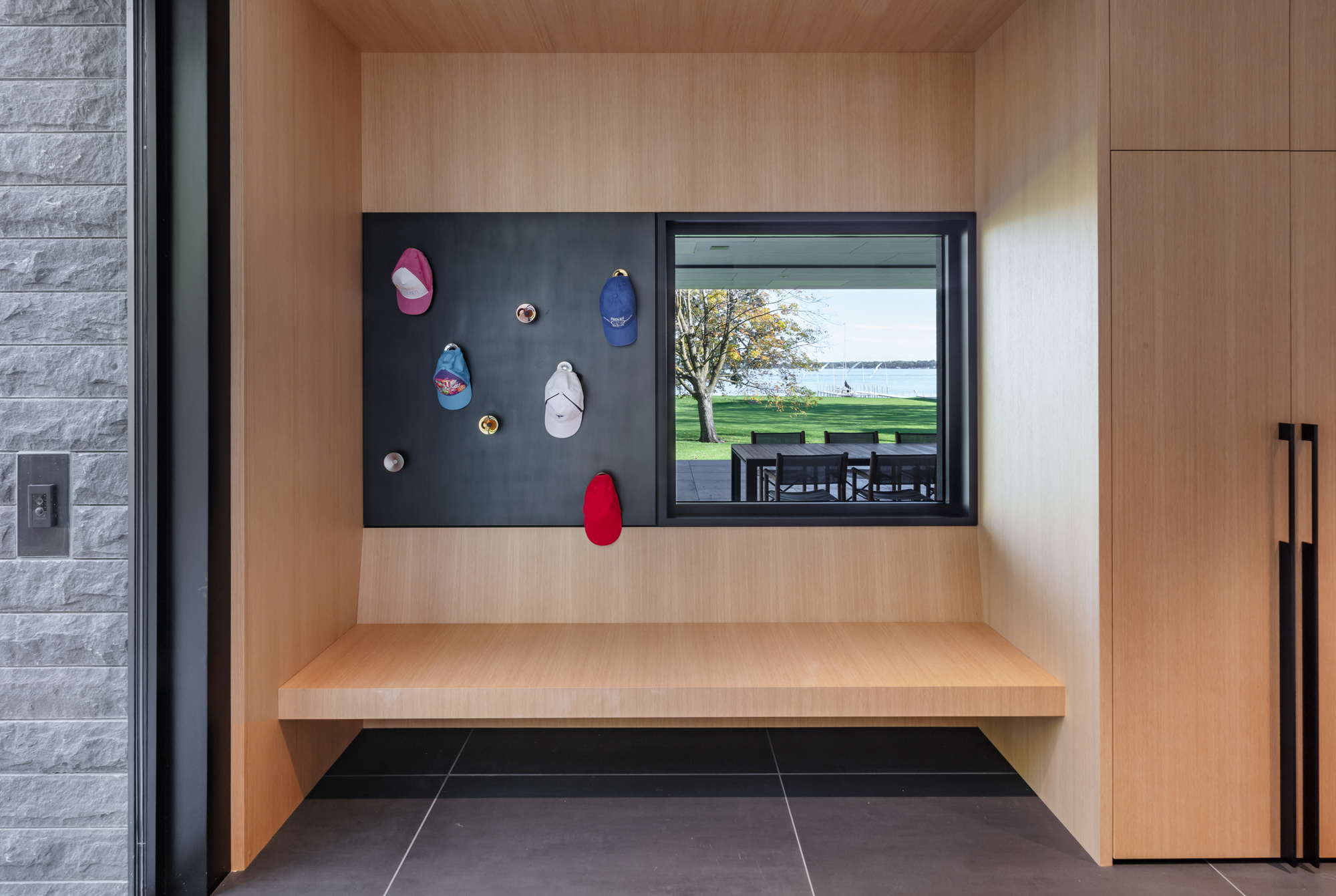Bayside mudroom bench with lake view