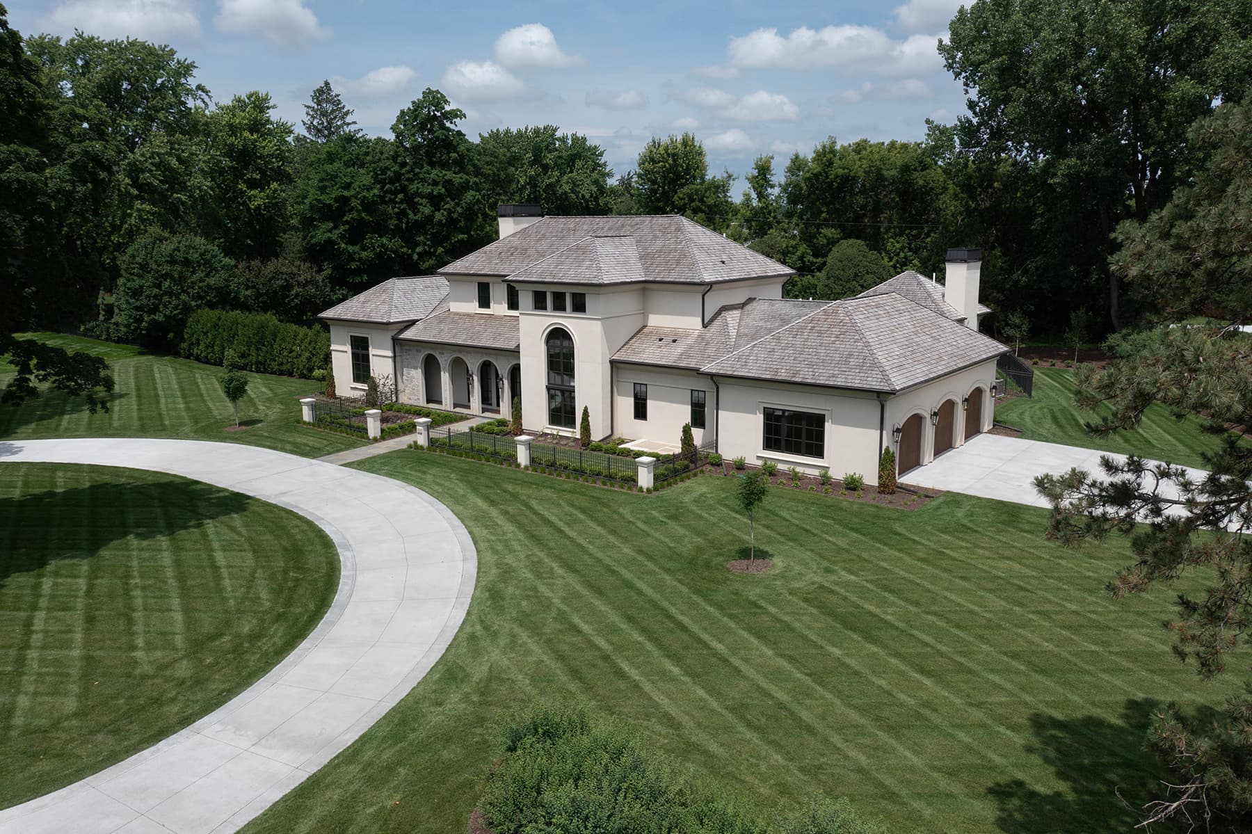 Aerial view of Highcroft's front elevation and circular drive