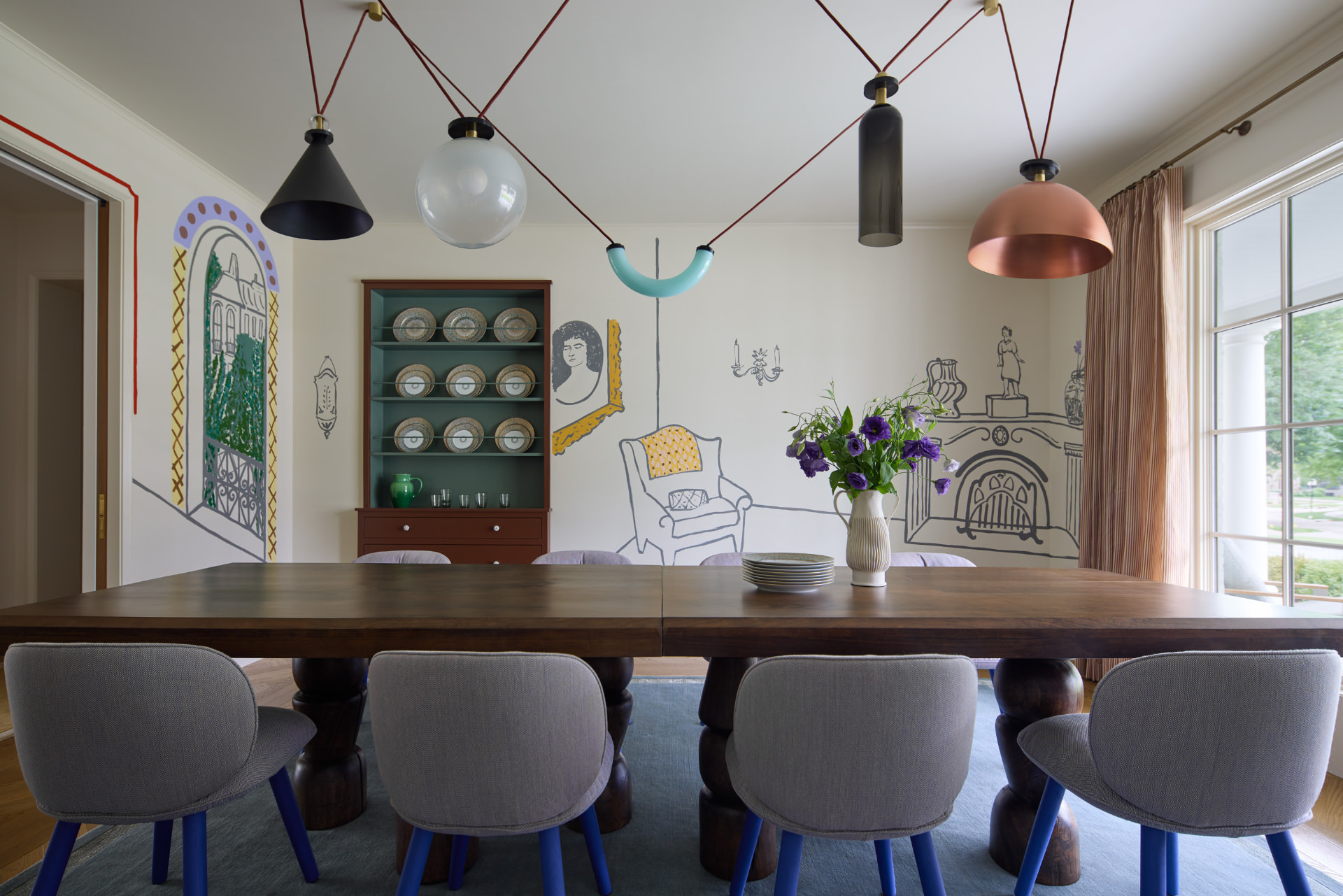 Waters Edge dining room with hand-drawn mural