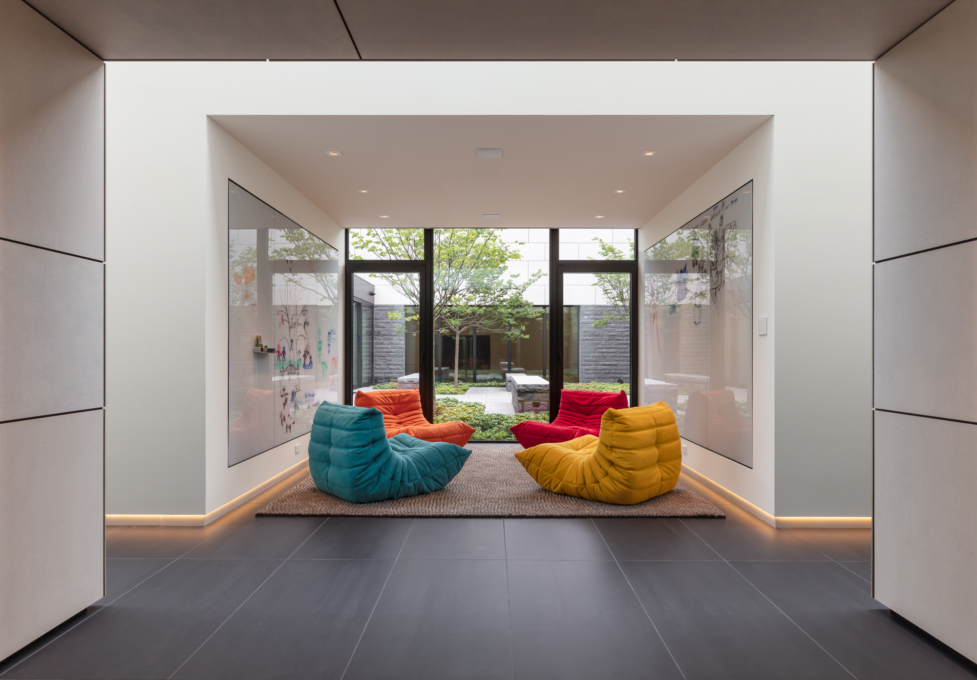 Bayside playroom and garden courtyard