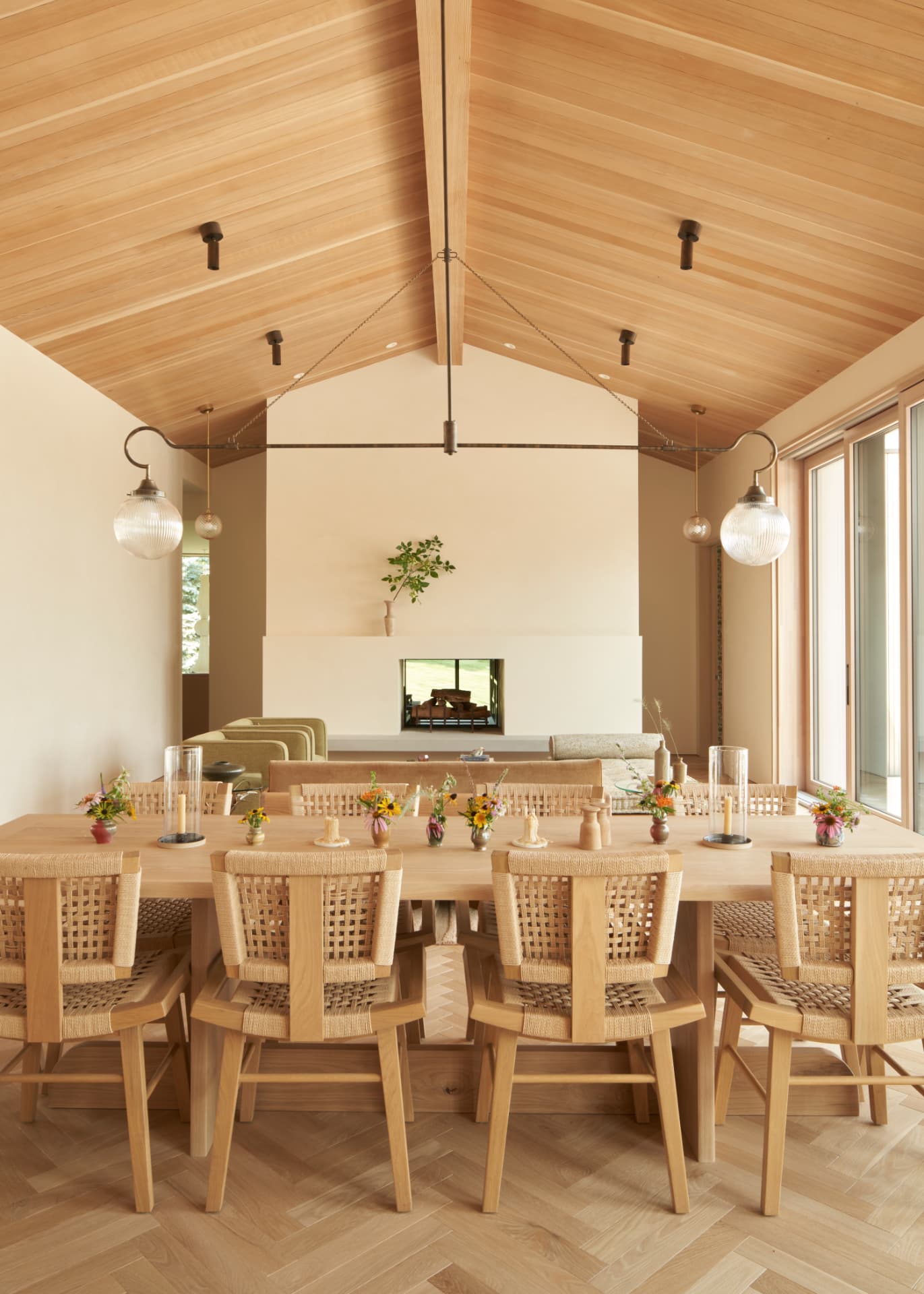 Hill House dining room beneath a vaulted white oak ceiling