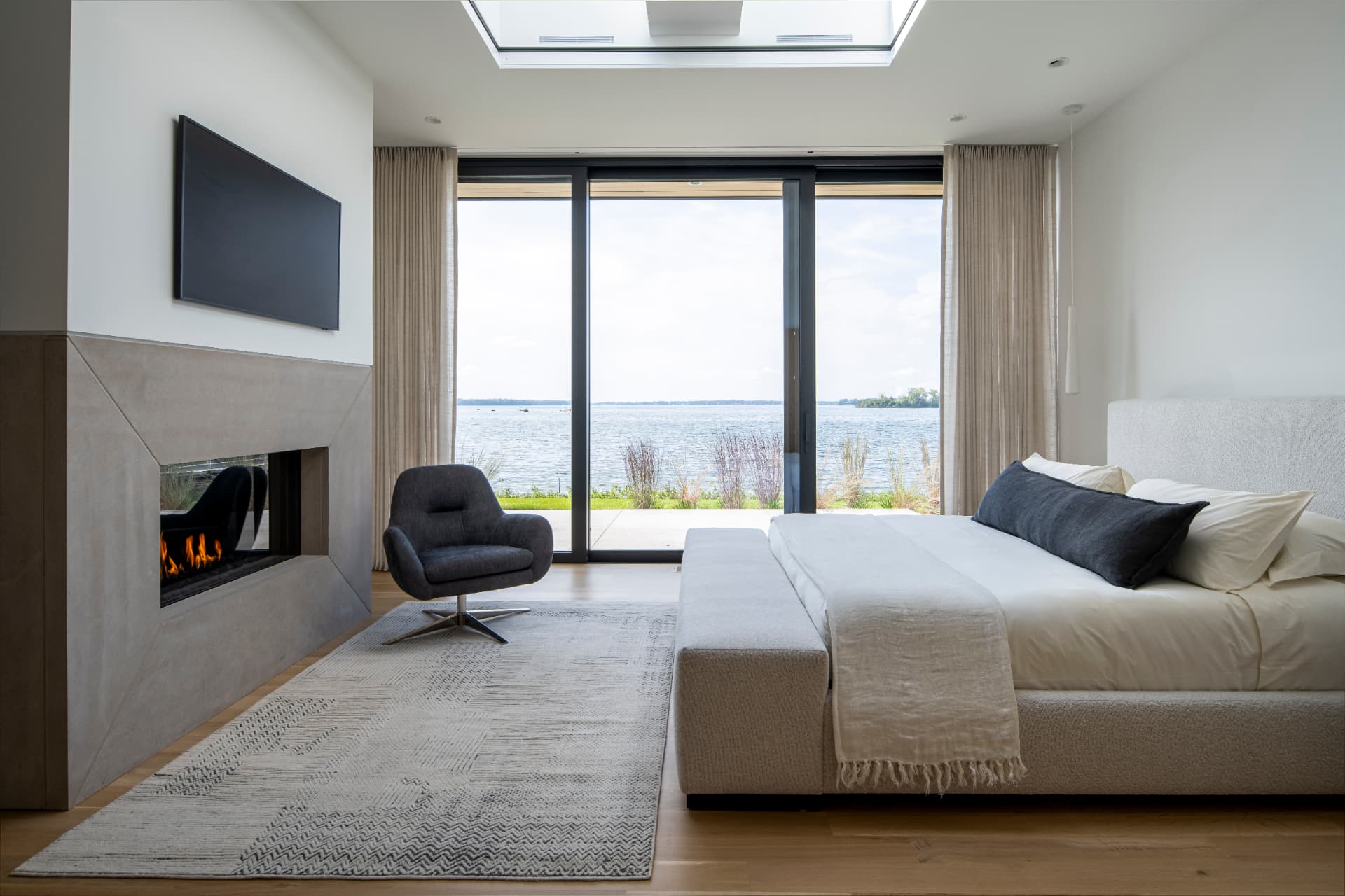 Shoreline Modern bedroom overlooking the lake