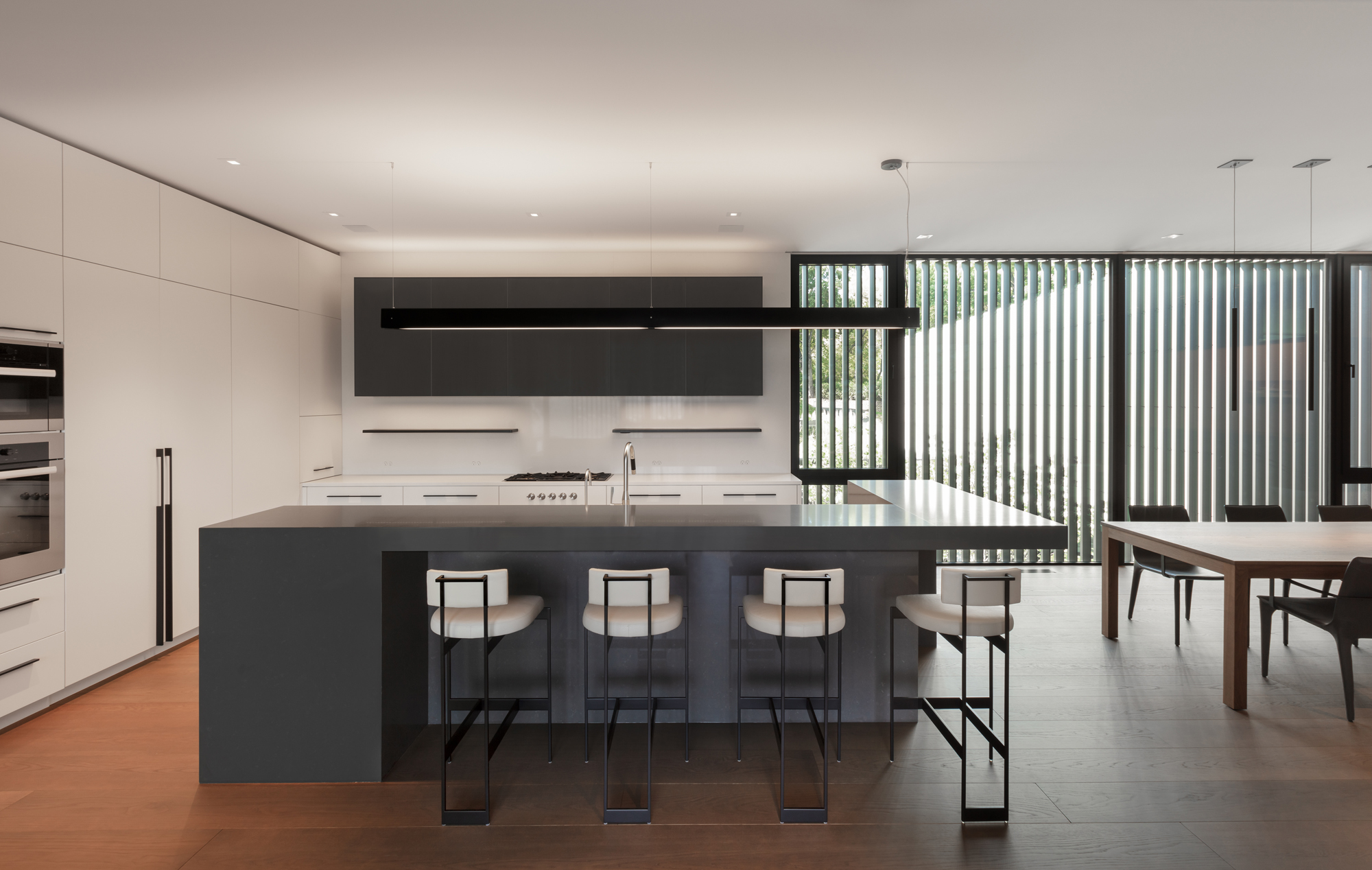 Bayside modern kitchen and dining area
