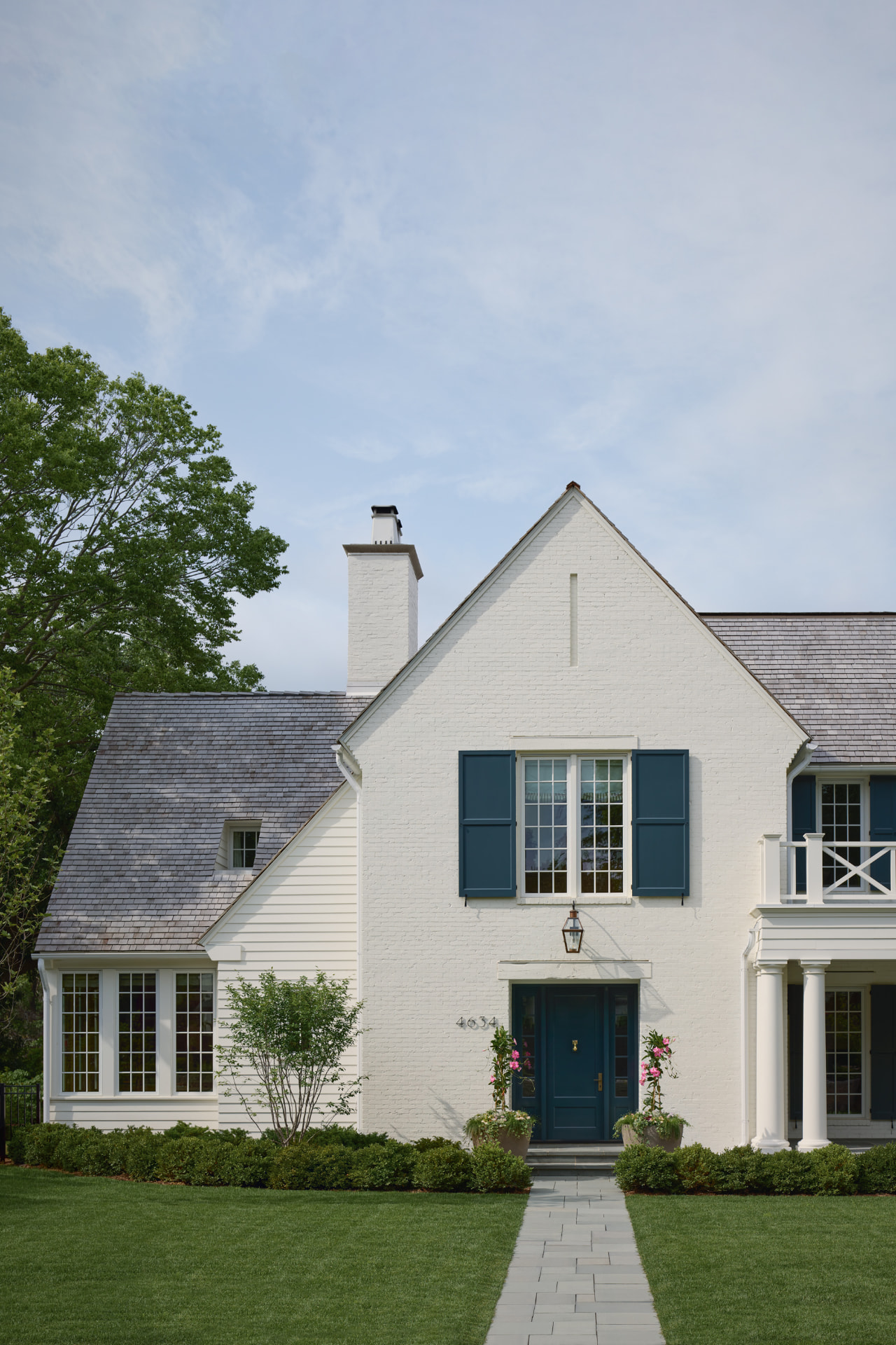 Waters Edge front entry and steep gabled roof