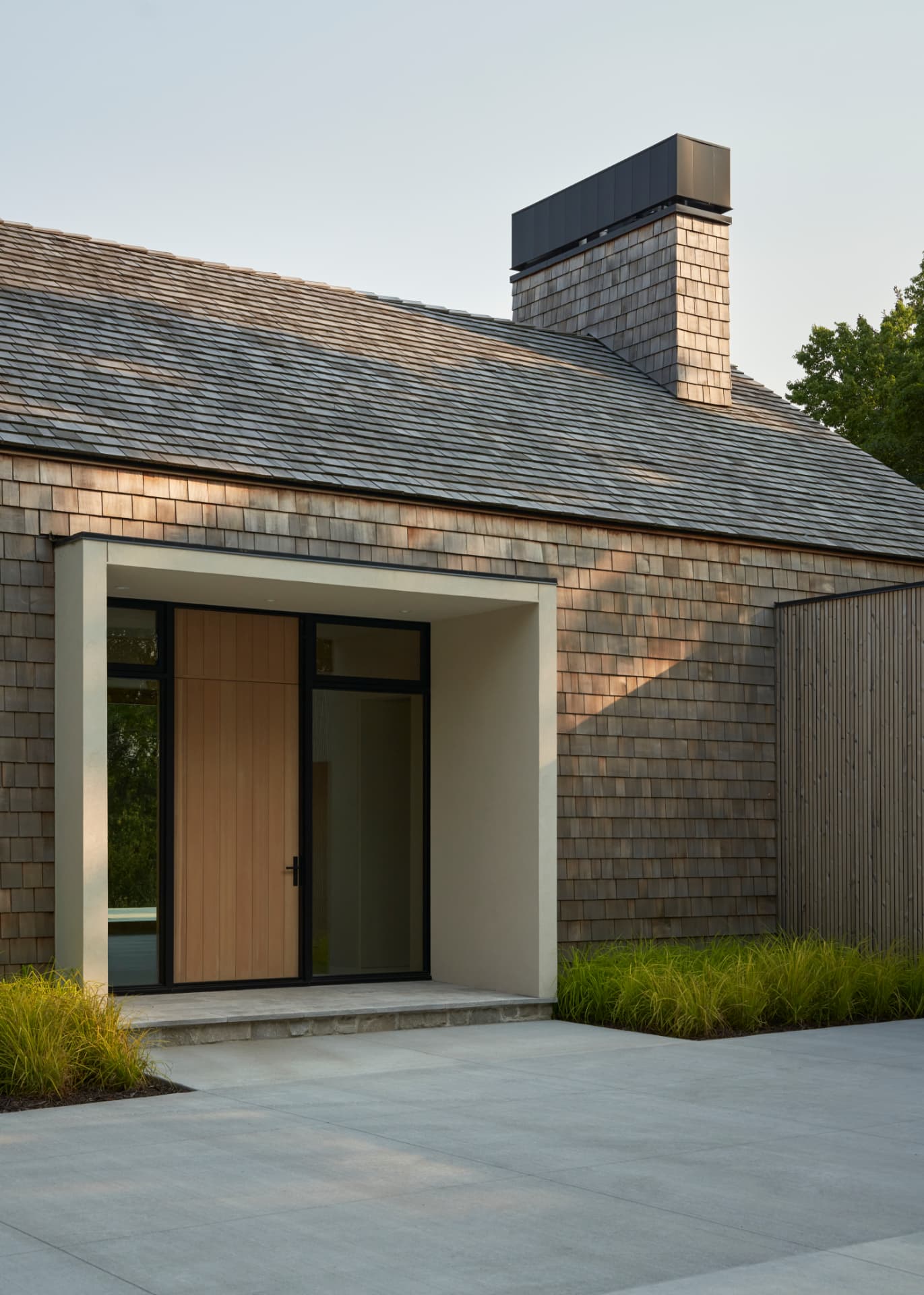 Hill House entry detail in weathered cedar and limestone