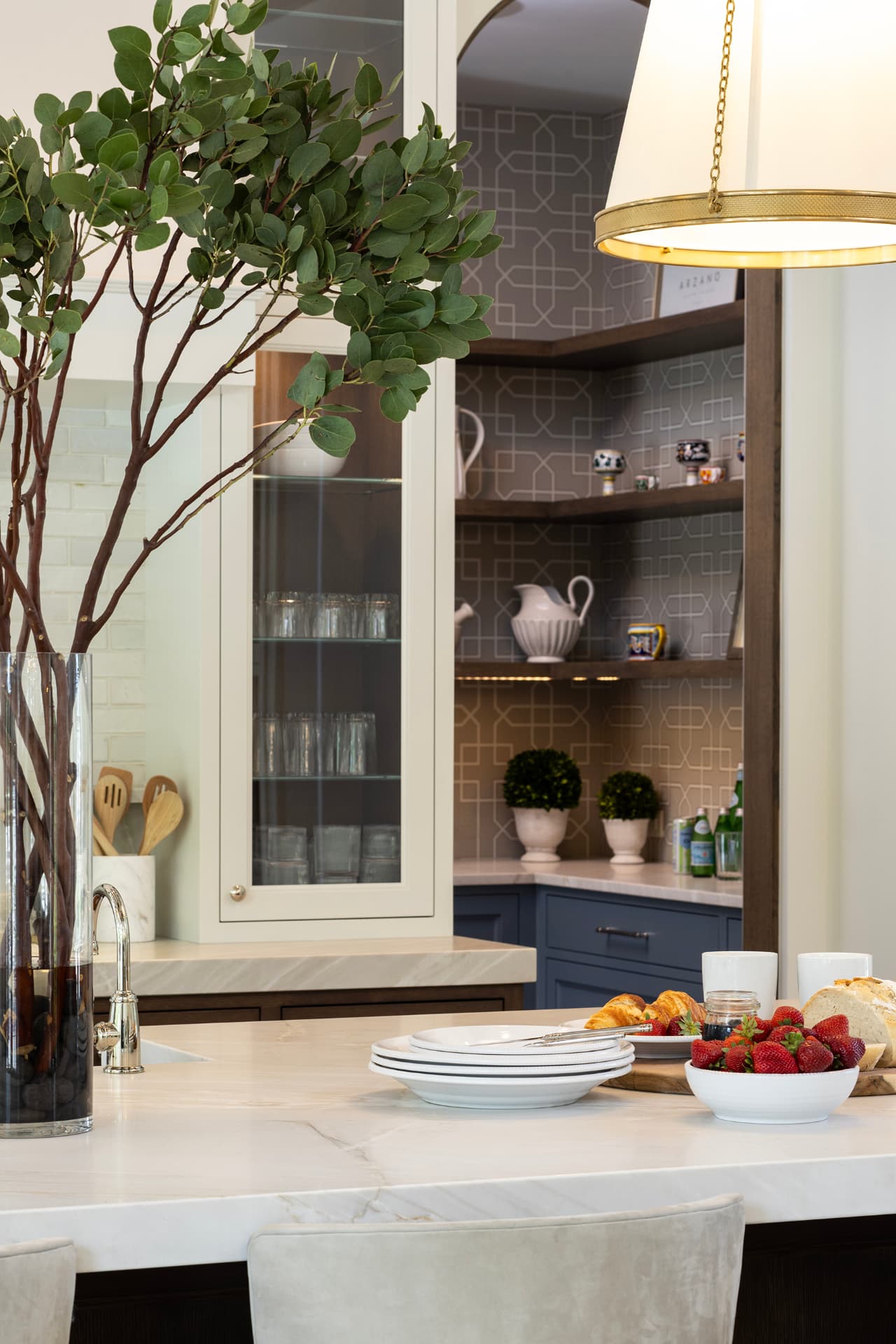 Highcroft kitchen detail with glass-front cabinet and blue pantry