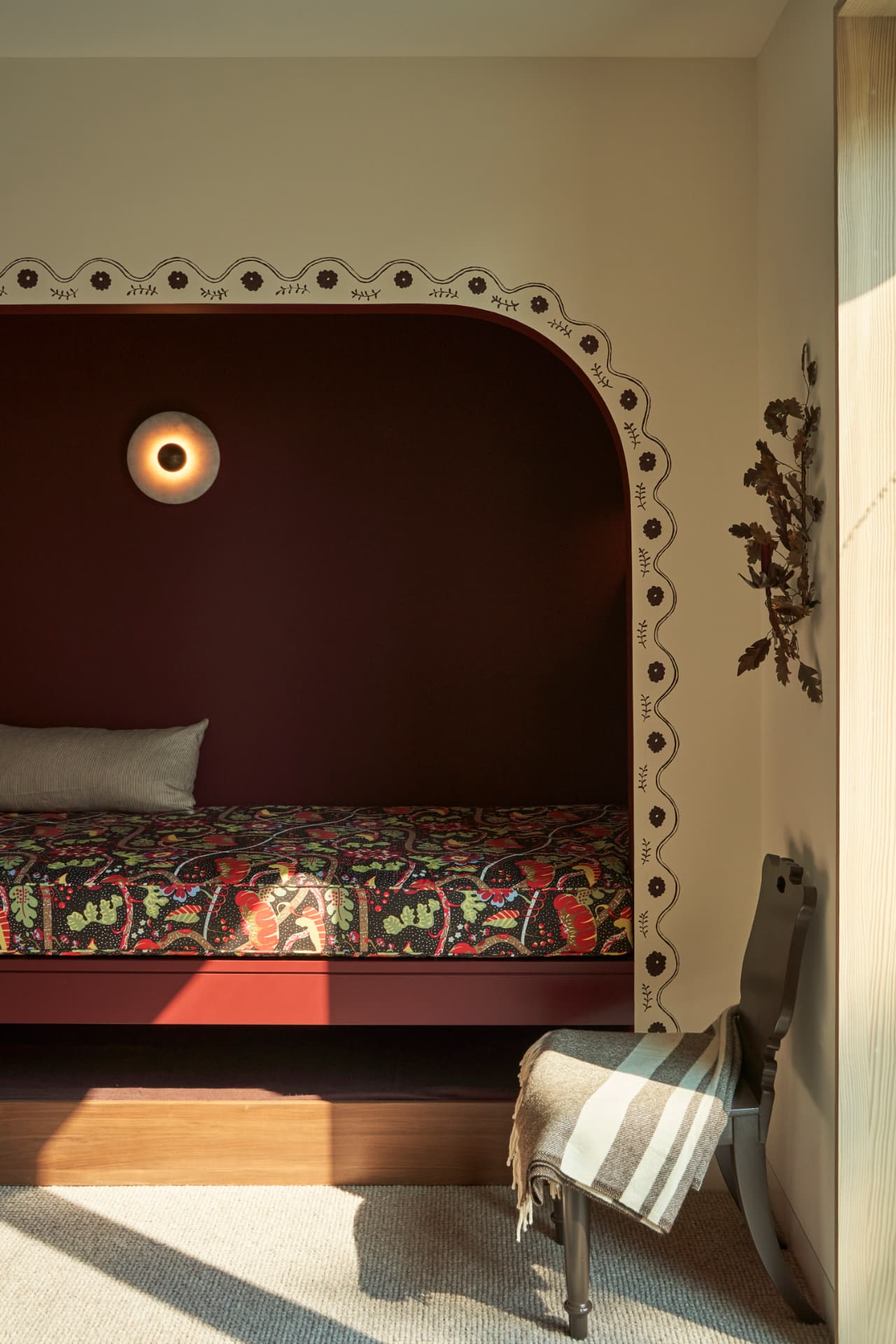 Hill House daybed detail with patterned pillows