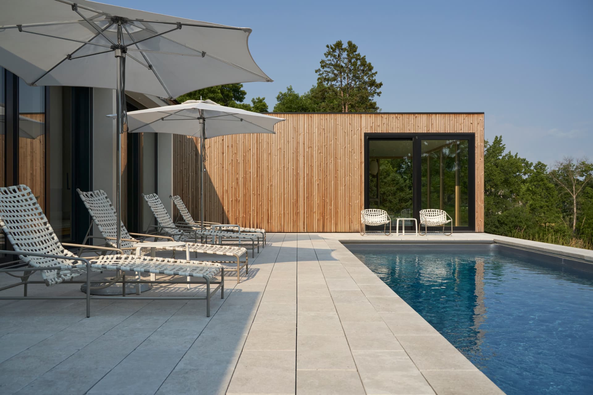 Hill House pool terrace and lakeside pavilion