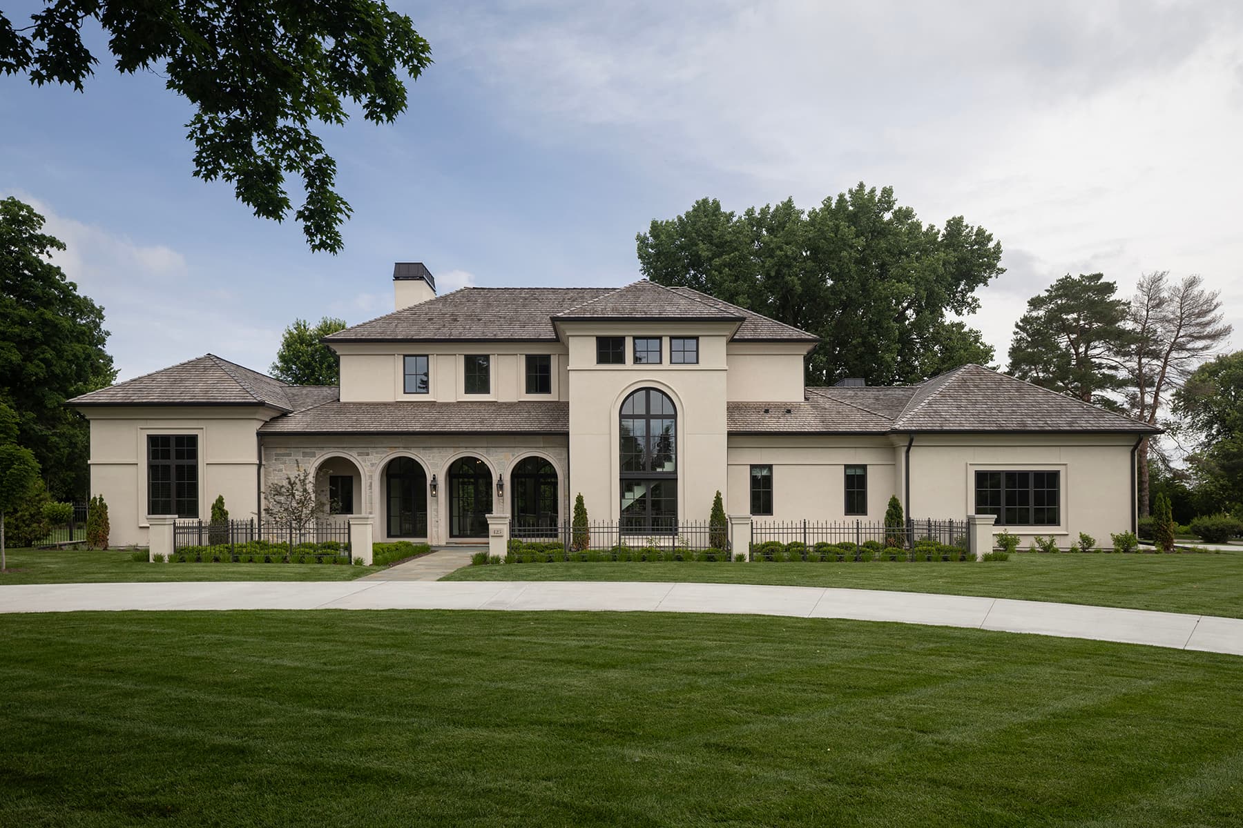 Highcroft classical exterior with arched loggia and slate roof