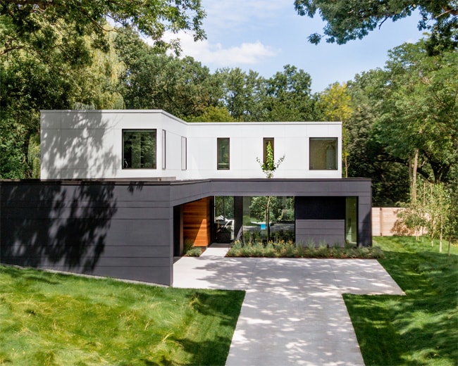 exterior of dark gray and white custom home